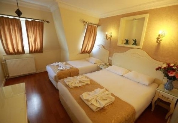 اتاق سه تخته هتل بزرگ پارک حیات مشهد